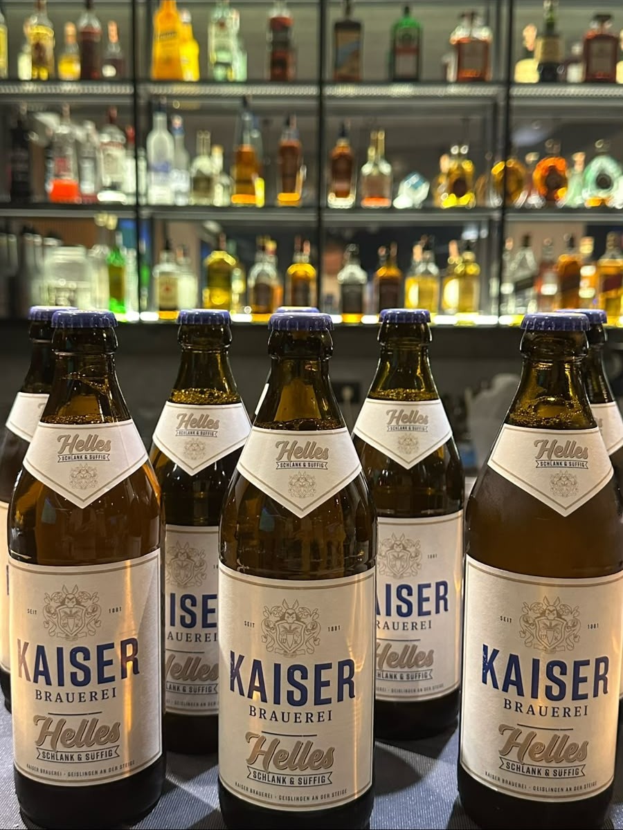 Kaiser Brauerei Helles bottles in front of the drinks shelf
